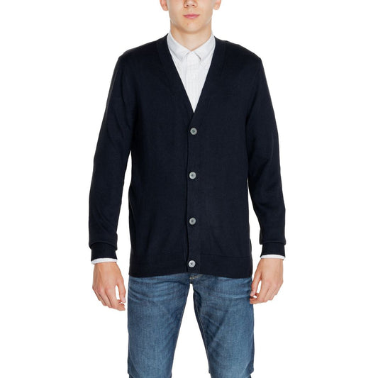 Man wearing Jack Jones Black Cotton Cardigan with button-down front and V-neckline, perfect for casual or smart outfits.