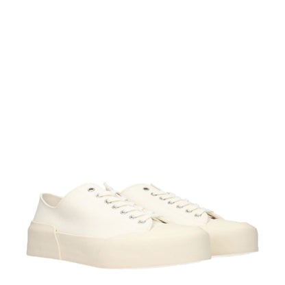 Jil Sander Beige Fabric Low Top Sneakers with lace-up closure, round toe, rubber sole, and mid heels, featuring back logo and ivory accents.