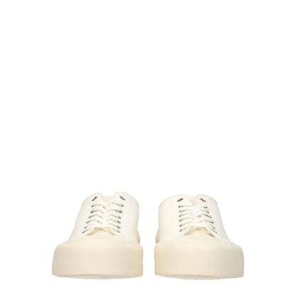 Jil Sander Beige Fabric Low Top Sneakers with lace-up closure and rubber sole, featuring back logo and round toe design.