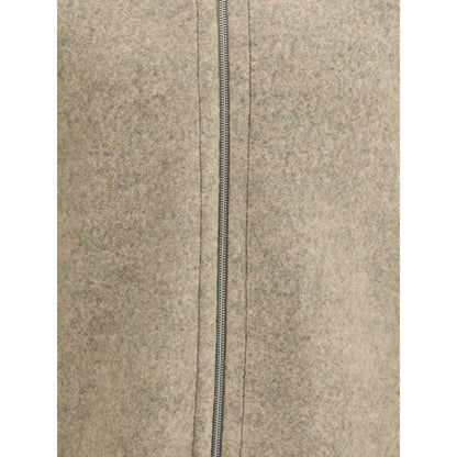 Close-up of Jil Sander Beige Wool Coat with zipper closure, showcasing its minimalist design and soft wool texture.