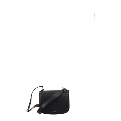 Jil Sander Black Leather Handbag with removable handle and button closure. Small casual bag with gold accents.