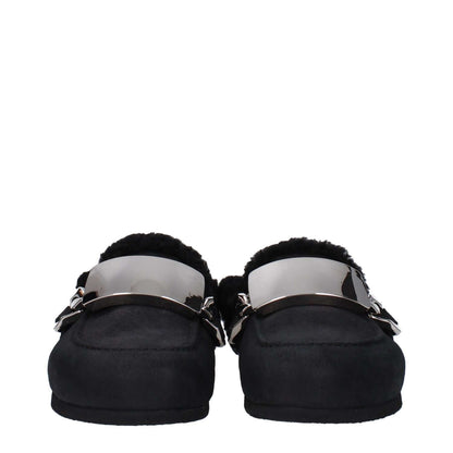 Jw Anderson Black Leather Slippers with silver details, fur interior, and rubber sole, featuring a side logo and casual style.