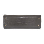 Bottom view of Kate Spade Grey Croc Embossed Leather Elissa Bristol Drive Tote Handbag Bag with gold-tone hardware.