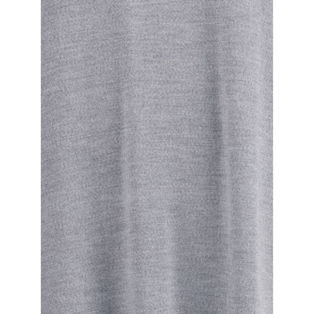 Close-up fabric texture of Khaite Gray Wool Casual Dress showcasing fine merino wool quality with a stylish and versatile design.