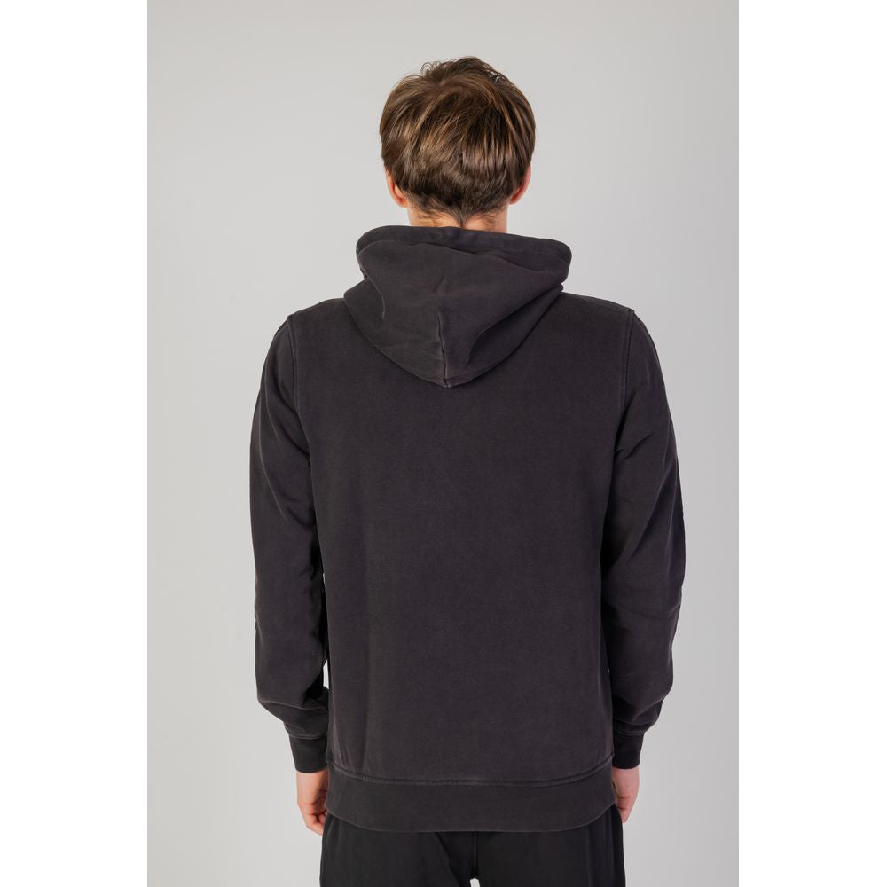 Rear view of a person wearing Liu Jo Black Cotton Hoodie, showcasing the hood and regular fit design.