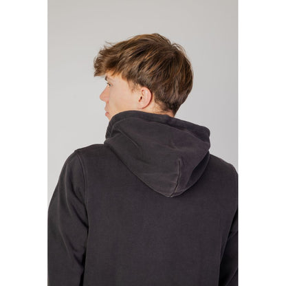Rear view of man wearing Liu Jo Black Cotton Hoodie with hood up