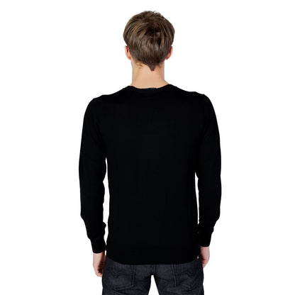Back view of a man wearing a Liu Jo Black Wool Sweatshirt, showcasing long sleeves and regular fit.