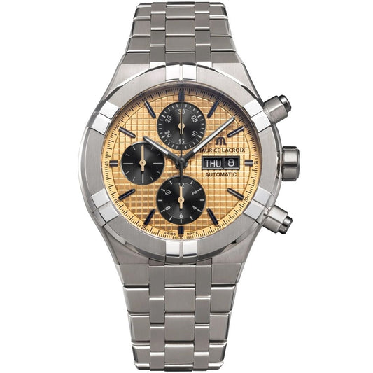 MAURICE LACROIX MOD. AI6038-TT032-530-1 luxury men's watch with a steel bracelet and gold-tone dial, showing chronograph functions.