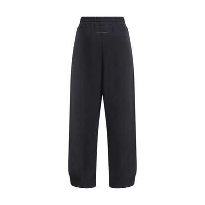 MM6 Black Cotton Joggers (Workout Pants) featuring elastic waistband, side pockets, and raw-cut slits for a modern look.