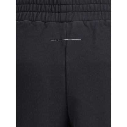 Close-up detail of MM6 Black Cotton Joggers (Workout Pants) showing elastic waistband and logo stitching.