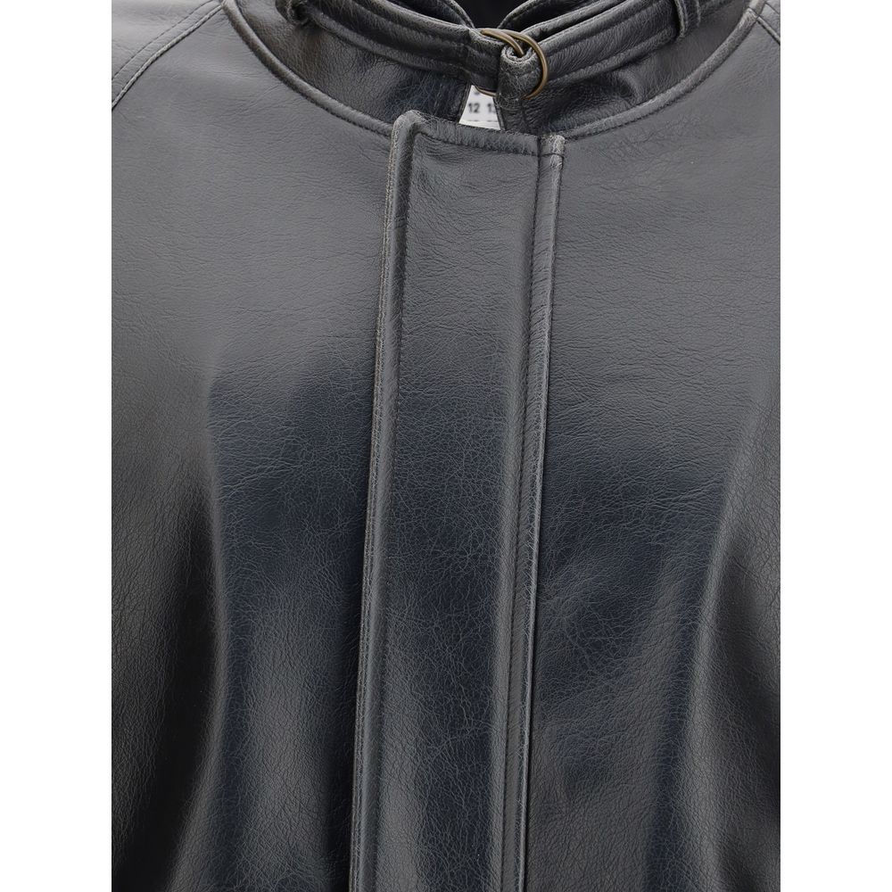 Close-up of MM6 Black Polyester Bomber with stand collar and buckle, showcasing tone-on-tone stitching and smooth texture.