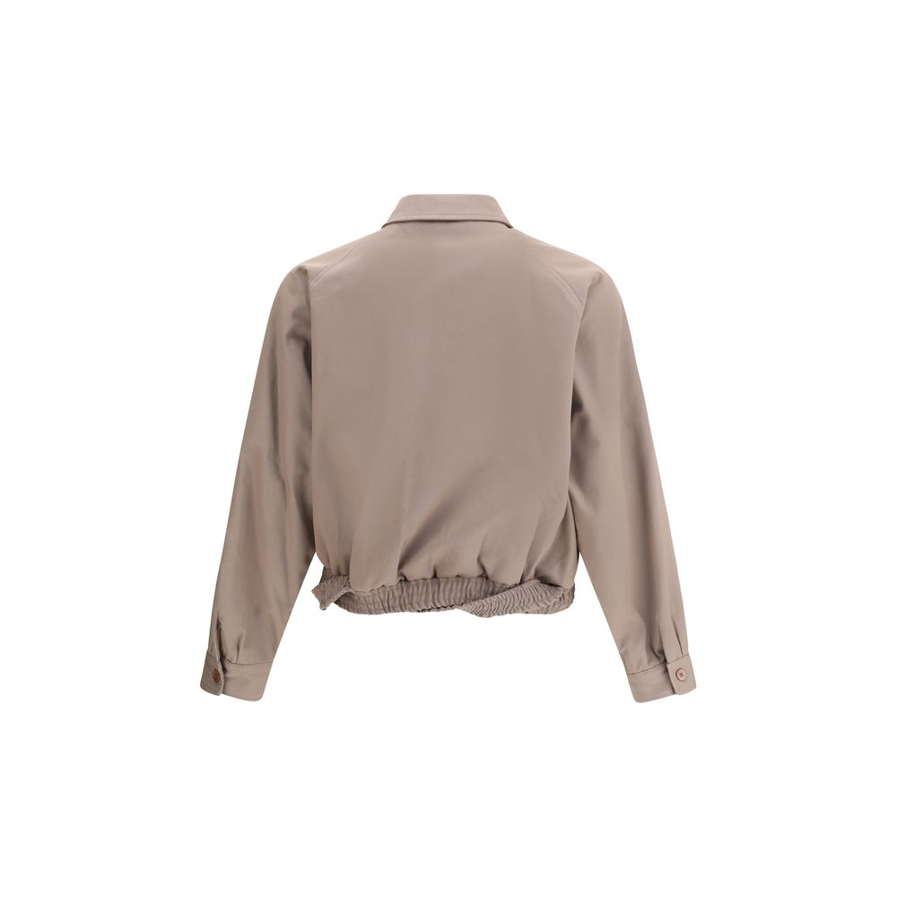 Back view of the Magliano Bicolor Cotton Full-Length Jacket showing elasticized hem and classic collar in beige shade.