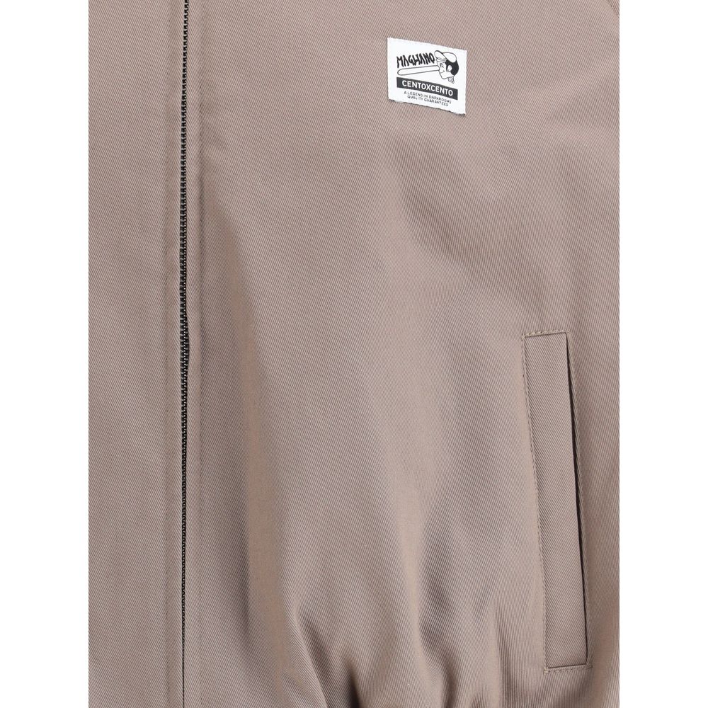 Magliano Bicolor Cotton Full-Length Jacket with classic collar, front zipper, and logo patch detail.