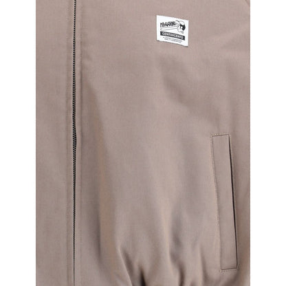 Magliano Bicolor Cotton Full-Length Jacket with classic collar, front zipper, and logo patch detail.