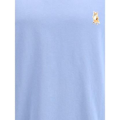 Maison Kitsuné Light Blue Cotton T-Shirt with embroidered Standing Fox patch on chest, featuring short sleeves and ribbed crew neck.