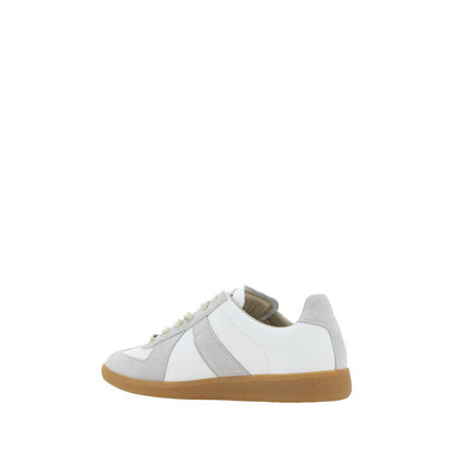 Side view of Margiela White Rubber Low Top Sneakers with gum sole and suede details.