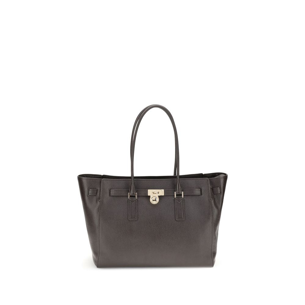 Michael Kors Brown Calf Leather Bos Taurus Shoulder Bag with decorative belt and padlock pendant.