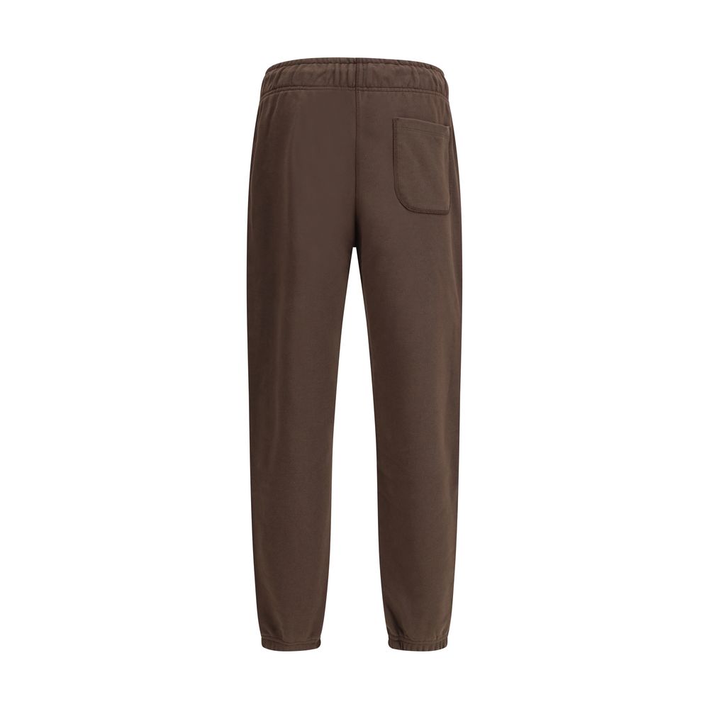 New Balance Brown Cotton Joggers (Workout Pants) with elastic waistband and side pockets, featuring logo patch for sporty style.