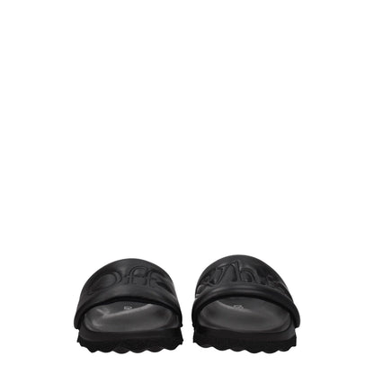Off-White Black Leather Slippers with logo and open toe design, featuring rubber sole, low flat heel, casual style.