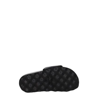 Sole view of Off-White Black Leather Slippers showcasing rubber grip and open toe design.