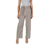 Woman wearing Only Beige Cotton Pant with belt, showcasing loose fit and casual style.