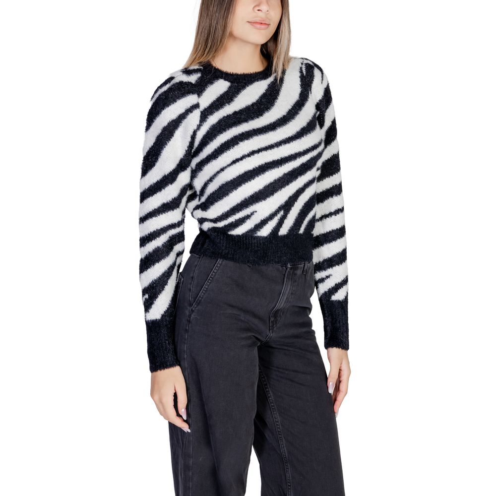Woman wearing Only Black Nylon Sweater from Fall/Winter collection, featuring zebra pattern design, 70% nylon and 30% acrylic composition.
