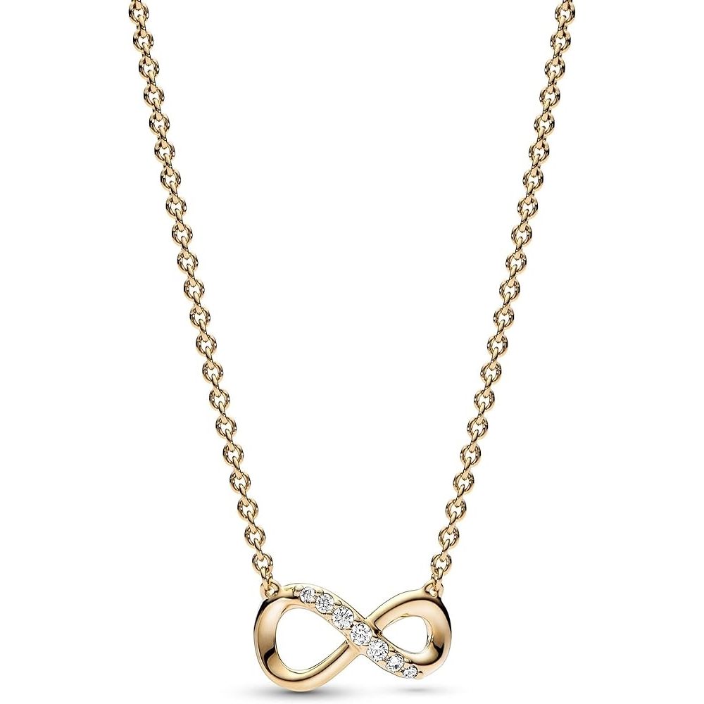 Gold infinity necklace with diamond accents on a chain, elegant jewelry piece for women.