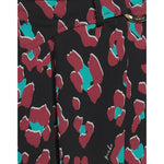 Close-up of PINKO Black Polyester Skirt with abstract print and Love Birds buckle. Pleated miniskirt with side button closure.