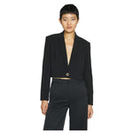 Woman wearing a chic PINKO Black Polyester Women Blazer, featuring a cropped design with gold button detail, against a white background.