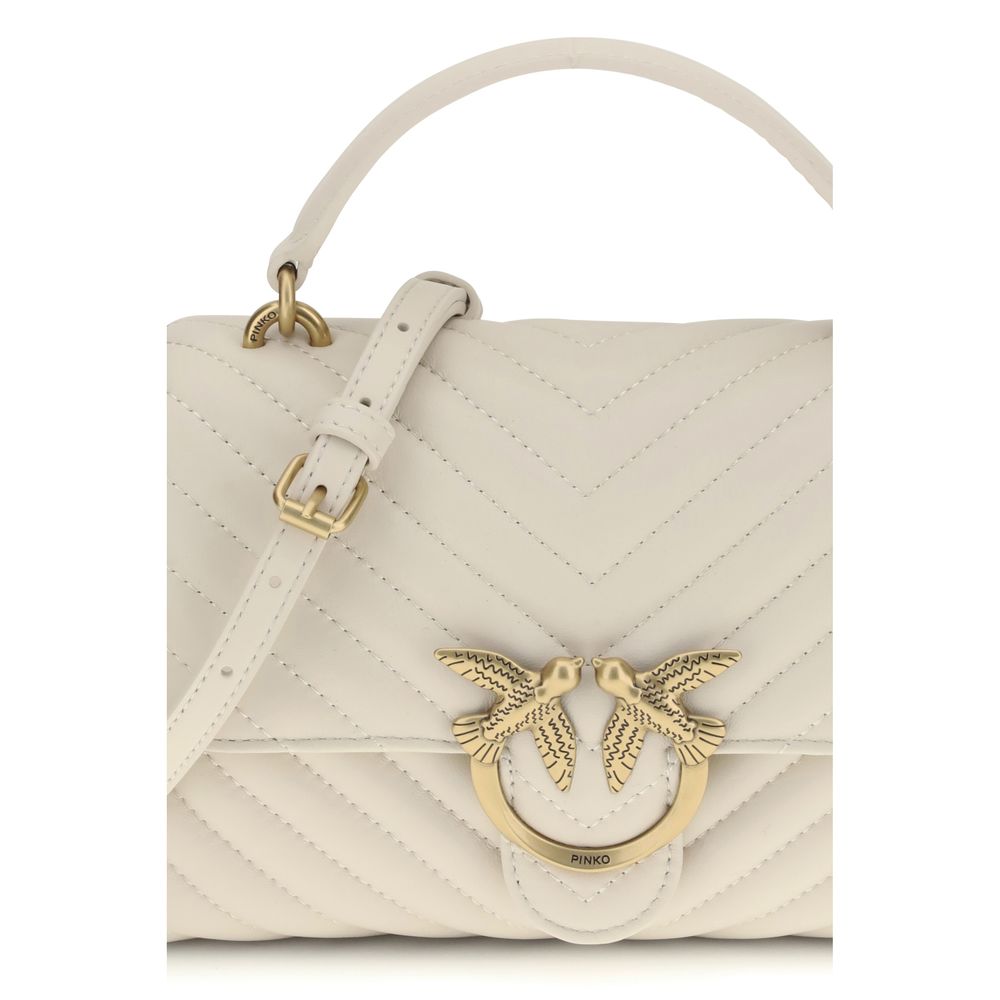 Front view with bag zipped and handles upright.