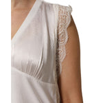 Close-up of PINKO White Silk Blend Lace Trim Sleeveless V-Neck Women’s Top showing lace shoulder detail on silk fabric.