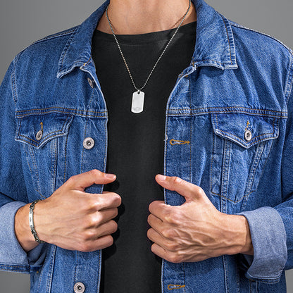Man wearing denim jacket and necklace, featuring POLICE JEWELS JEWELRY Mod. PEAGB0008701.