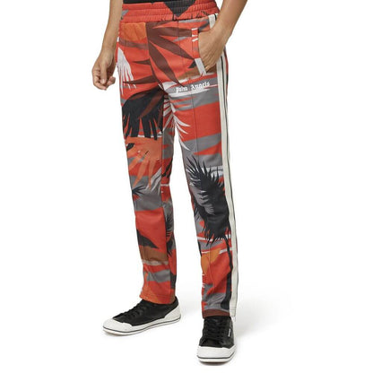Palm Angels Red Polyester Joggers (Workout Pants) featuring elasticated waist and side pockets on a male model.
