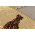 Close-up of Patrizia Pepe Gold Leather Embellished Shoulder Strap Bag with crystal detailing and gold chain, showing missing crystals.