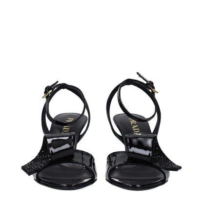 Prada Black Leather Stiletto Heel Sandals with buckle closure and open toe design, mid heels, leather sole, side detail, casual style.