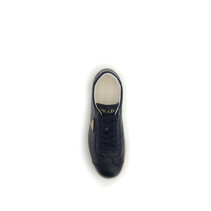 Prada Blue Calf Leather Bos Taurus Low Top Sneakers with embossed logo and padded ankle, top view.