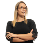 Lady wearing ROXY MOD. ERJEG03031 52ABRN glasses with arms crossed and smiling, dressed in black with lace sleeves.