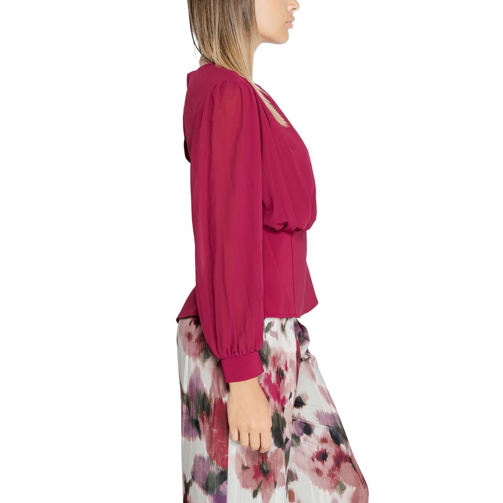 Side view of woman wearing Rinascimento Bordeaux Polyester Blouse, part of Fall/Winter collection.