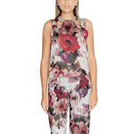 Woman wearing Rinascimento Bordeaux Polyester Tank Top from fall/winter collection, showcasing vibrant floral design.