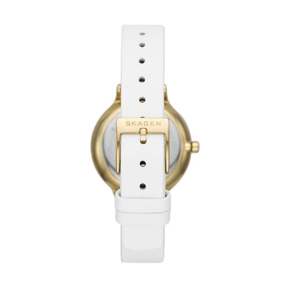 SKAGEN Mod. ANITA LILLE watch with white leather strap and gold stainless steel case, showcasing elegant design and quartz movement.