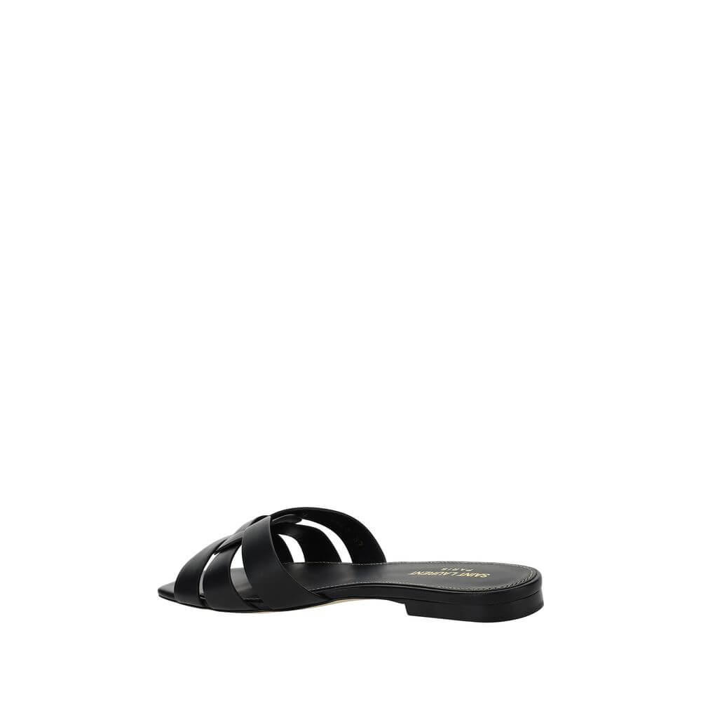 Saint Laurent Black Calf Leather Bos Taurus Flat Sandals with braided design and open square toe.