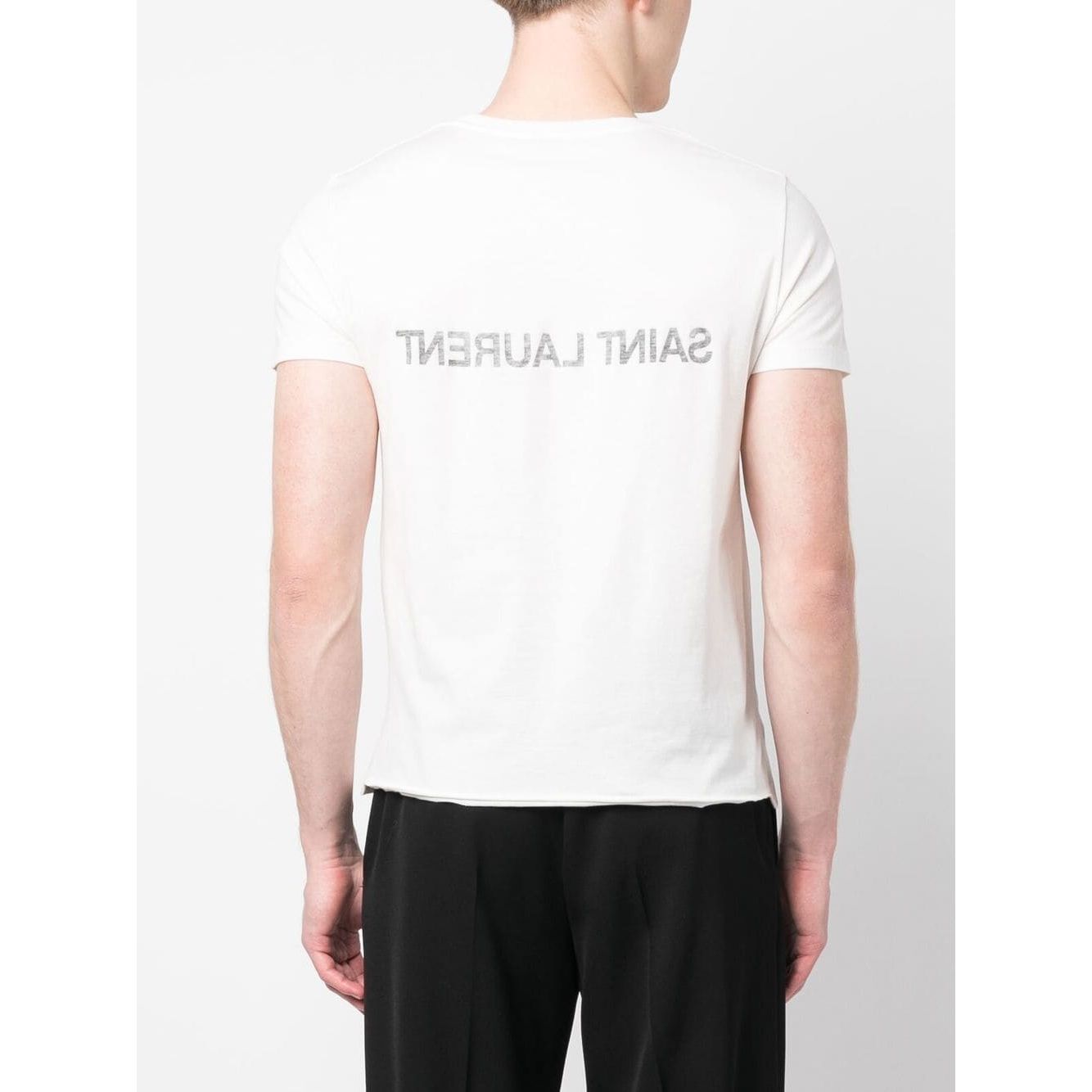 Back view of Saint Laurent Logo T-shirt with reverse logo print, white cotton, short sleeves, round neck, model wearing size M, black pants.