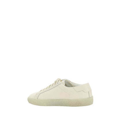 Saint Laurent White Rubber Low Top Sneakers with embroidered brand signature and crater-effect sole, side view.