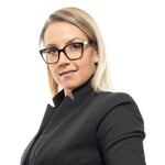 Woman wearing Sandro Multicolor Women Glasses Frame with full-rim trapezium style and plastic lenses; stylish multicolor eyewear.