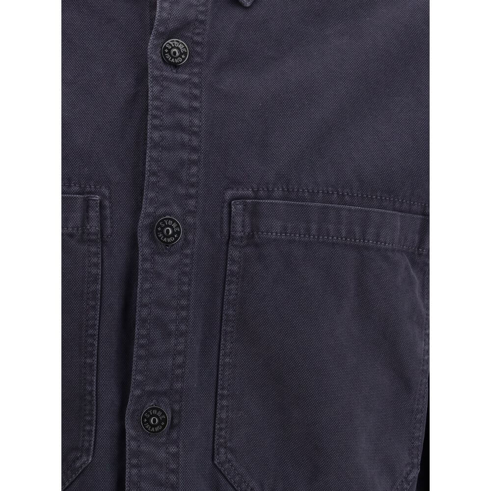 Close-up of Stone Island Blue Cotton Dress Shirt showing patch pockets and buttons.