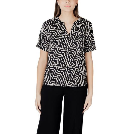 Woman wearing Street One Black Viscose Blouse with patterned design, short sleeves, and V-neck, ideal for casual or evening wear.