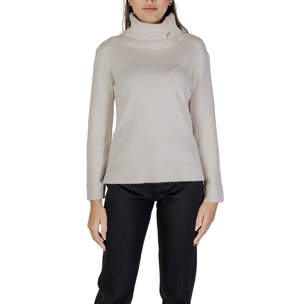 Woman wearing Street One Cream Viscose Turtleneck with button details and long sleeves for stylish warmth.