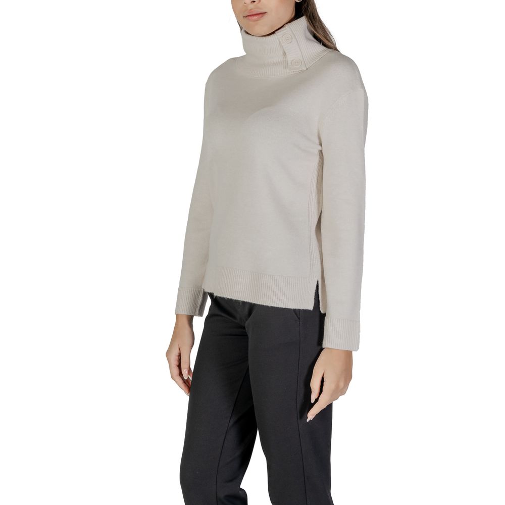 Street One Cream Viscose Turtleneck with stylish side buttons for women, featuring long sleeves and high neck for warmth and comfort.