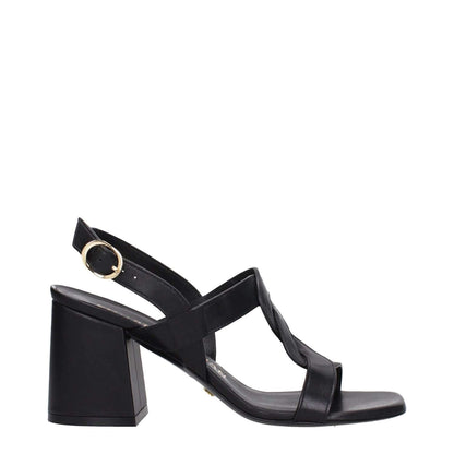 Stuart Weitzman Black Leather Platform Sandals with buckle closure, open toe, mid heels, and leather sole. MPN: IBIZA75SMOSH845BLACK.
