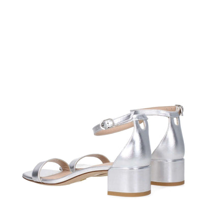 Stuart Weitzman Gray Leather Sandals featuring silver leather, open toe, buckle closure, and mid heels, perfect for casual style.